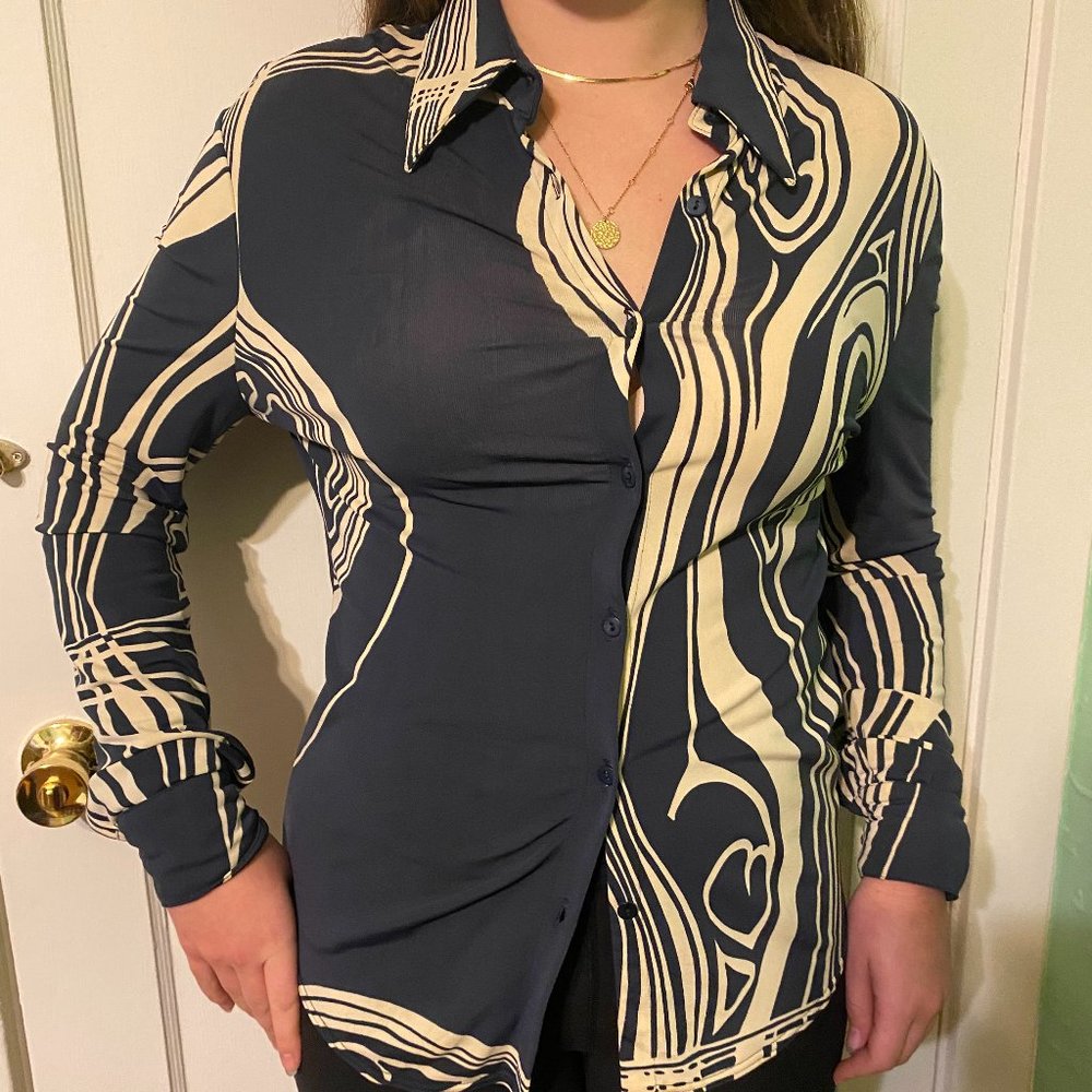 Dark blue and white marble print button down blouse.